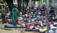 Police force ferry passengers to lie down after firing tear gas and detaining them in Mombasa