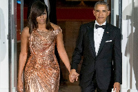 Barack Obama, former US President with wife Michelle who tested negative