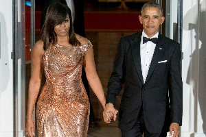 Barack Obama, former US President with wife Michelle who tested negative