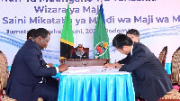 President Samia Suluhu Hassan, witnesses the signing of water projects contracts for 28 towns