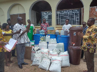 Mr Agyeman (left) making the presentation to Mr Adansi-Pipim (right)