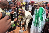 Saddique Boniface breaking the ground for the construction of the pitch