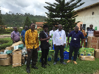 Wilson Arthur receiving items presented by Golden Star Resources