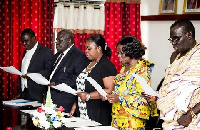 The members of the board being sworn into office