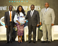 Francis Asenso-Boakye in a group photograph with participants at the Home Ownership Series