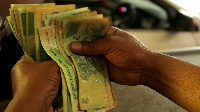 File Photo: Banks customers will use the local currency to repay loans that were given in US dollars