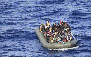 A group of 169 people were picked were picked up from an overflowing wooden boat