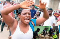 A trader wailing as AMA workers break down tables