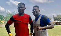 Asamoah Gyan with his teammate Fatawu Dauda