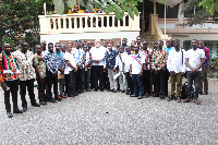 The group in a memorable photo with Rawlings