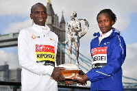 Men's elite race winner Kenya's Eliud Kipchoge (left) and Women's elite race winner Kenya's Brigid K