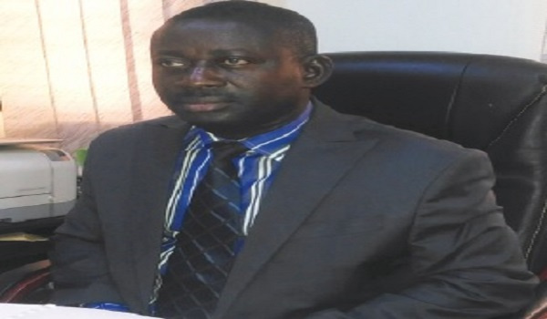 Michael Wilberforce Osae,  General Manager of Amantin and Kasei Community Bank