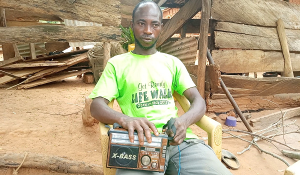 One of the interviewees listening to a radio