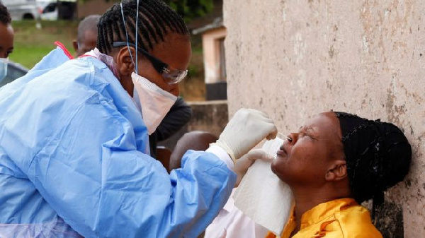 File photo showing a woman being tested for coronavirus