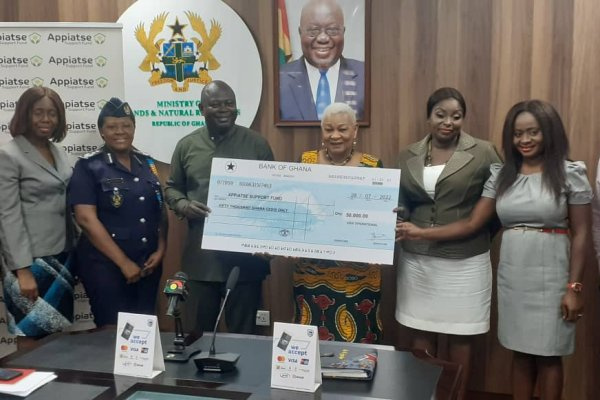 Madam Joyce Aryee, Apiate Fund chair (third right) receives the GRA cheque