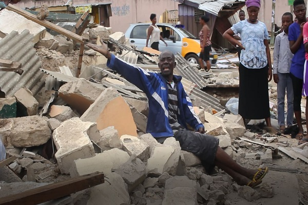 A physically challenged victim of the demolition lamenting his loss