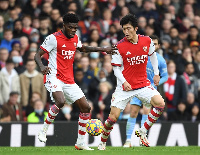 Thomas Parety and Arsenal teammate Takehiro Tomiyasu