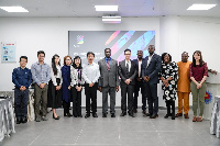 Members of the Education Ministry and Netdragon websoft Inc in a group photograph