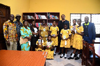 Some staff of Access Bank, students and teachers in a group photograph