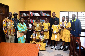 Some staff of Access Bank, students and teachers in a group photograph