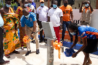 Cowbell in partnership with World Vision commissioning the borehole