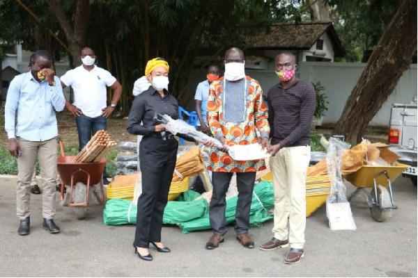 The MP presenting the items to Assembly Members