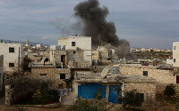 Smoke raise from a site targeted by multiple airstrikes, allegedly carried out by Syrian government