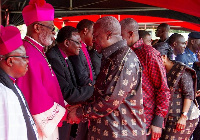 File photo: President John Mahama exchanges pleasantries with some members of the clergy.