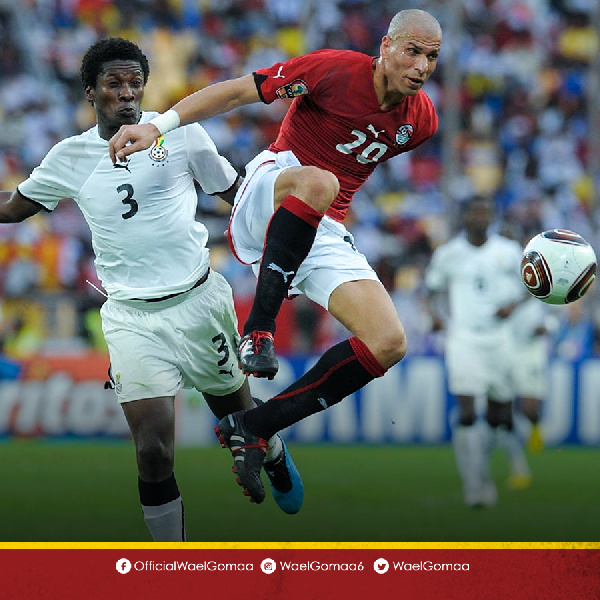 Wael in a tussle for the ball with Gyan