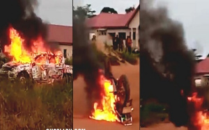 Cars being burnt at voter registration center