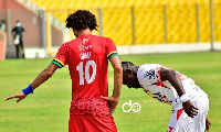 Asante Kotoko midfielder, Fabio Gama Dos Santos and Accra Hearts of Oak's Patrick Razak