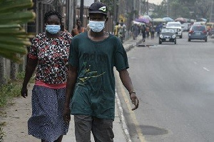 A photo of people in their nose masks