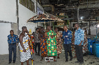 The  Akwamuhene, Odeneho Kwafo Akoto III (in green) toured the company on Feb 26