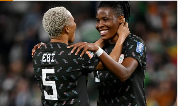 Nigeria's Onome Ebi and Osinachi Ohale celebrate after the match