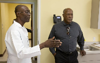 John Amos with Dr. Kwadwo Gyarteng-Dakwa, who is bringing a medical programme to Ghana