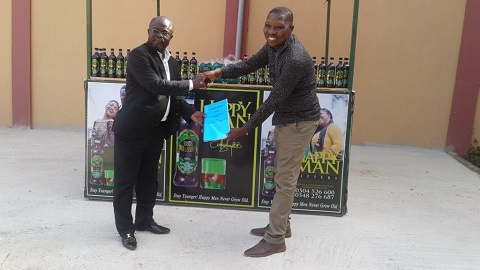 Oduro Sarfo with the CEO of Happy Man Bitters, Emmanuel Bortey Borketey