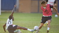 Partey in a challenge during Arsenal training