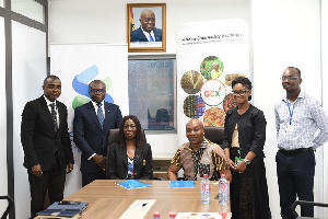 Officials of Standard Chartered Bank, Ghana Commodity Exchange after signing the MoU