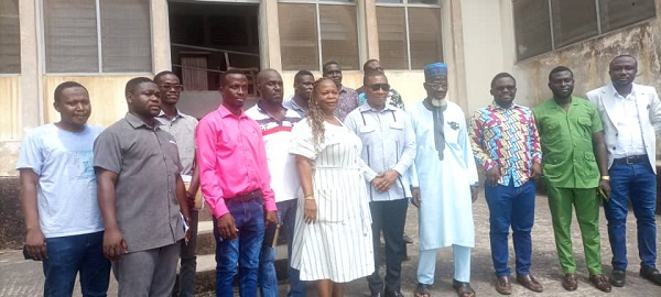 George Mireku Duker in a group picture with some gold buyers