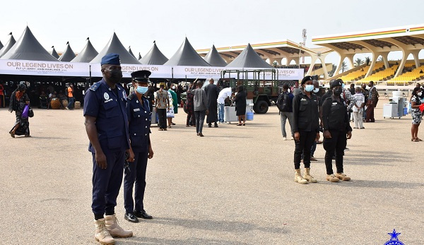 Police played different roles at the Rawlings funeral.