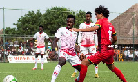 Asante Kotoko's Fabio Gama (right) in action