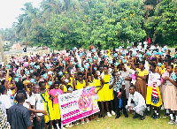 Students holding the pads they received from the teachers