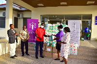 Staff of Executive Women Network presenting the relief items to a hospital