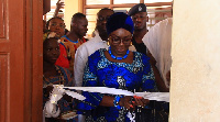 Ursula Owusu-Ekuful cutting the sod for the project