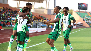 Samuel Chukwueze, Kelechi Iheanacho, Ola Aina and Joe Aribo celebrating a goal