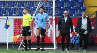 A Uruguayan player limp off the pitch over an injury