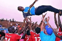 Kwesi Appiah held shoulder high by his players