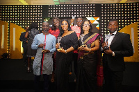 Staff of Vodafone Ghana displaying the awards