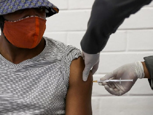 A Photo Of A Man Being Vaccinated