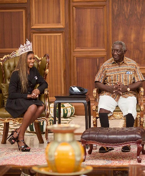 Ex-President John Agyekum Kufuor with beauty queen Chelsea Tayui